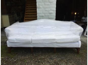 White Slipcovered Sofa