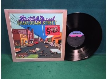 The Grateful Dead. Shakedown Street On Arista Records. Vinyl Is Near Mint. Jacket Is Very Good Plus Plus.