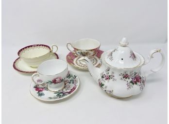 Mixed Vintage Teapot, Teacups, And Saucers (1)