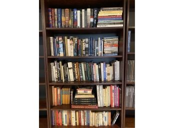 Five Shelves Of Assorted Books