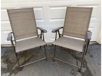 A Pair Of Folding Outdoor Chairs