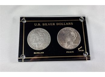 Dollars Of The US 1882 Morgan Dollar And 1924 Peace Dollar In Lucite Screw Case