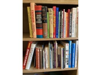 Two Shelves Of Books On Jokes, Comedy