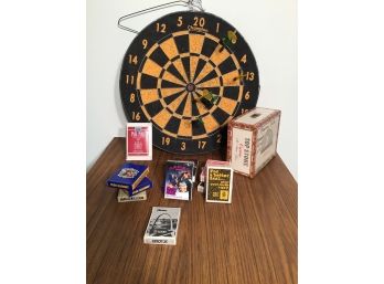 Vintage Dartboard And Decks Of Playing Cards