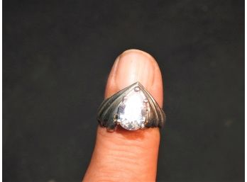 Unusual Style Sterling Silver Ring With Clear Cut Stone