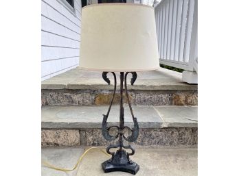 Iron Table Lamp Mounted On A Black Marble Base With A Paper Drum Shade