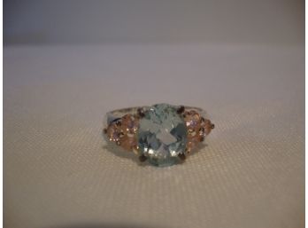 Sterling Light Blue Center Stone Ring With Pink Stones On Sides