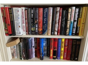 Two Shelves With 35 Plus Books