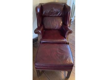 Classic Style Leather Wingchair With Brass Tacking And Matching Ottoman