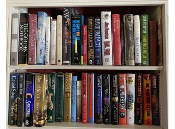 Two Shelves With 35 Plus Books