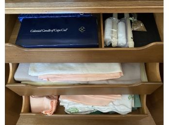 Three Chock Full Drawers Of Linens And Candles