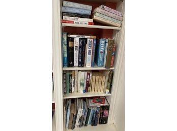 Four Shelves Of Books 50 Plus