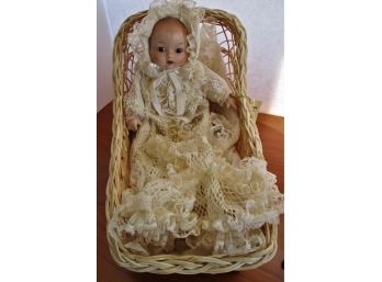 Baby Doll In Wicker Cradle