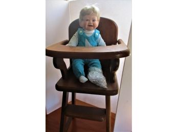 Doll In High Chair