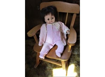 Doll In Rocking Chair