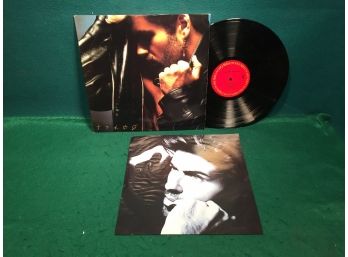 George Michael. Faith On Columbia Records. Vinyl Is Very Good Minus. Jacket Is Good Plus.