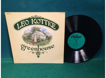 Leo Kottke. Greenhouse On Capitol Records. Vinyl Is Very Good Plus - Very Good Plus Plus. Jacket Is Very Good.