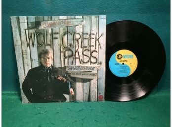 C. W. McCall. Wolf Creek Pass On MGM Records Stereo. Vinyl Is Very Good Plus. Jacket Is Very Good Plus.