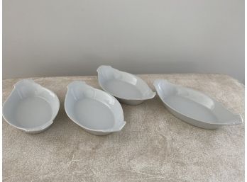 Four Small Oval Serving Dishes