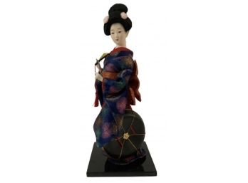 Ornate Oriental Handmade Doll On Stand