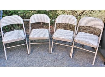 Four Samsonite Upholstered Folding Chairs