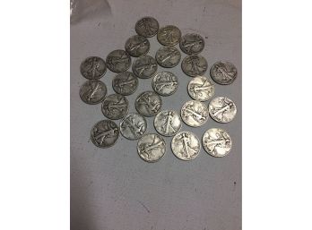 24 Standing Liberty Half Dollars . Various Dates . Good Condition