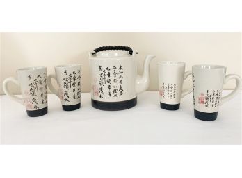 Oriental StonewareTeapot With Four Matching Cups