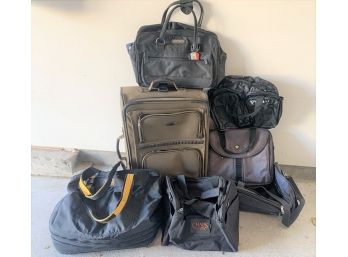 Group Of Seven Suitcases & Travel Bags