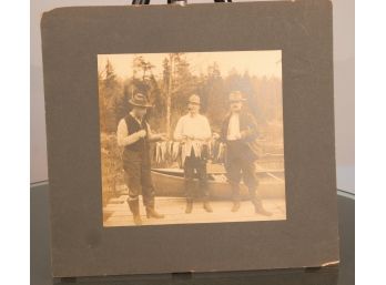 Early Photo Of Men Fishing On Board