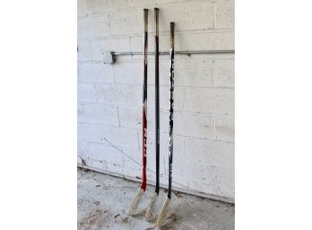 Set Of Three Hockey Sticks