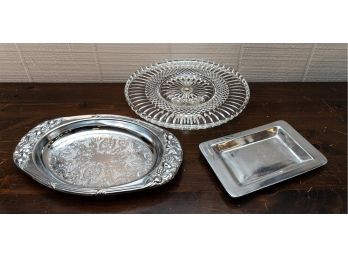 Silver Tone Metal Serving Platters And Cut Glass Footed Cake Plate