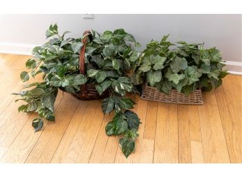 A Pair Of Faux Houseplants In Woven Baskets