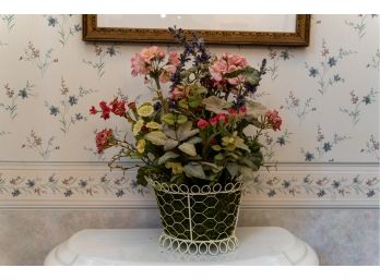 Faux Flower Arrangement In White Wire Basket