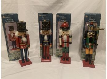 4 Wooden Nutcrackers Individually Hand Painted