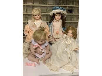 4 Porcelain Dolls