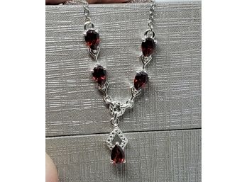 Mozambique Garnet Necklace In Sterling And Stainless