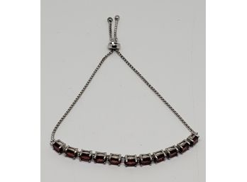 Oval Garnet, Rhodium Over Sterling Bolo Bracelet