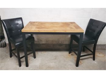 Handsome Bar Height Wood Table With Pair Of Matching Black Faux Leather Chairs