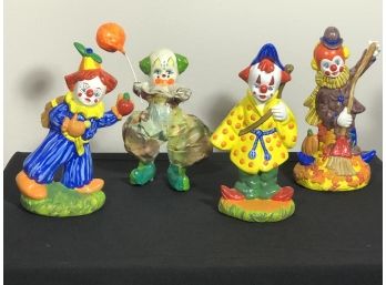 Four Colorful Porcelain Clowns Engraved 'RK'