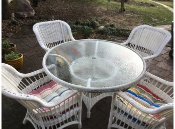 White Wicker Patio Set Includes Four Chairs, Chair Pads, And Umbrella Stand