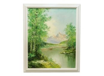 Signed Daniels Oil On Canvas Painting Of A Lake Amongst Lush Greenery With Mountains