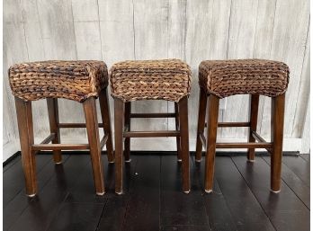 Three Pottery Barn Rattan/grass Stools