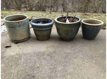 Four Flower Pots In Shades Of Blue