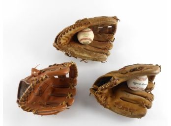 Equipment - 3 Gloves With 2 Balls - One A 2000 World Series Souvenir