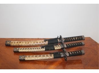 Set Of Three Ninja Swords With Snakeskin Wrapped Sheaths