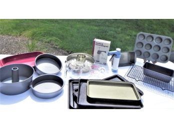 Assortment Of Bakeware Including Calphalon Pizza Pansand More