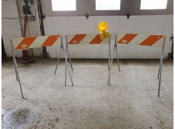 Three Orange Reflective Safety Barrier Stands - One With Light Attachment