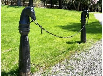 A Pair Of 19th Century Cast Iron And Wood Hitching Posts