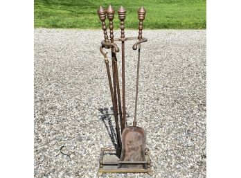 A Set Of Antique Bronze Fireplace Tools