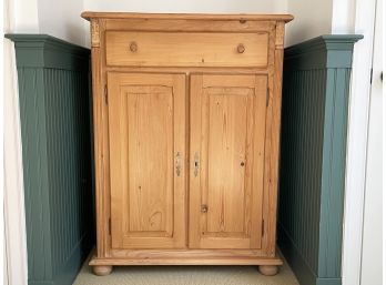 A Vintage Paneled Pine Cabinet